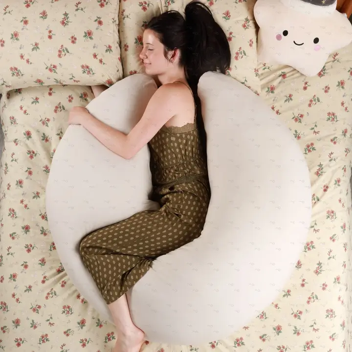 Curled up inside the MoonSpoon on a floral bed