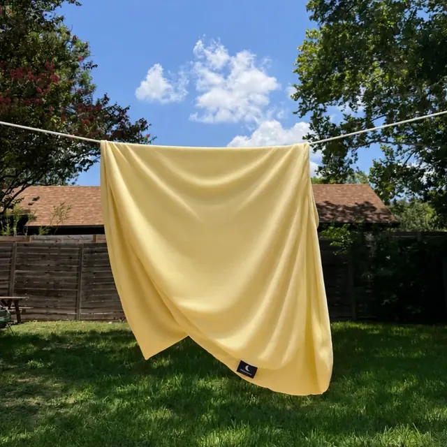 Butter Yellow MoonSpoon™ replacement zip cover photographed outdoors