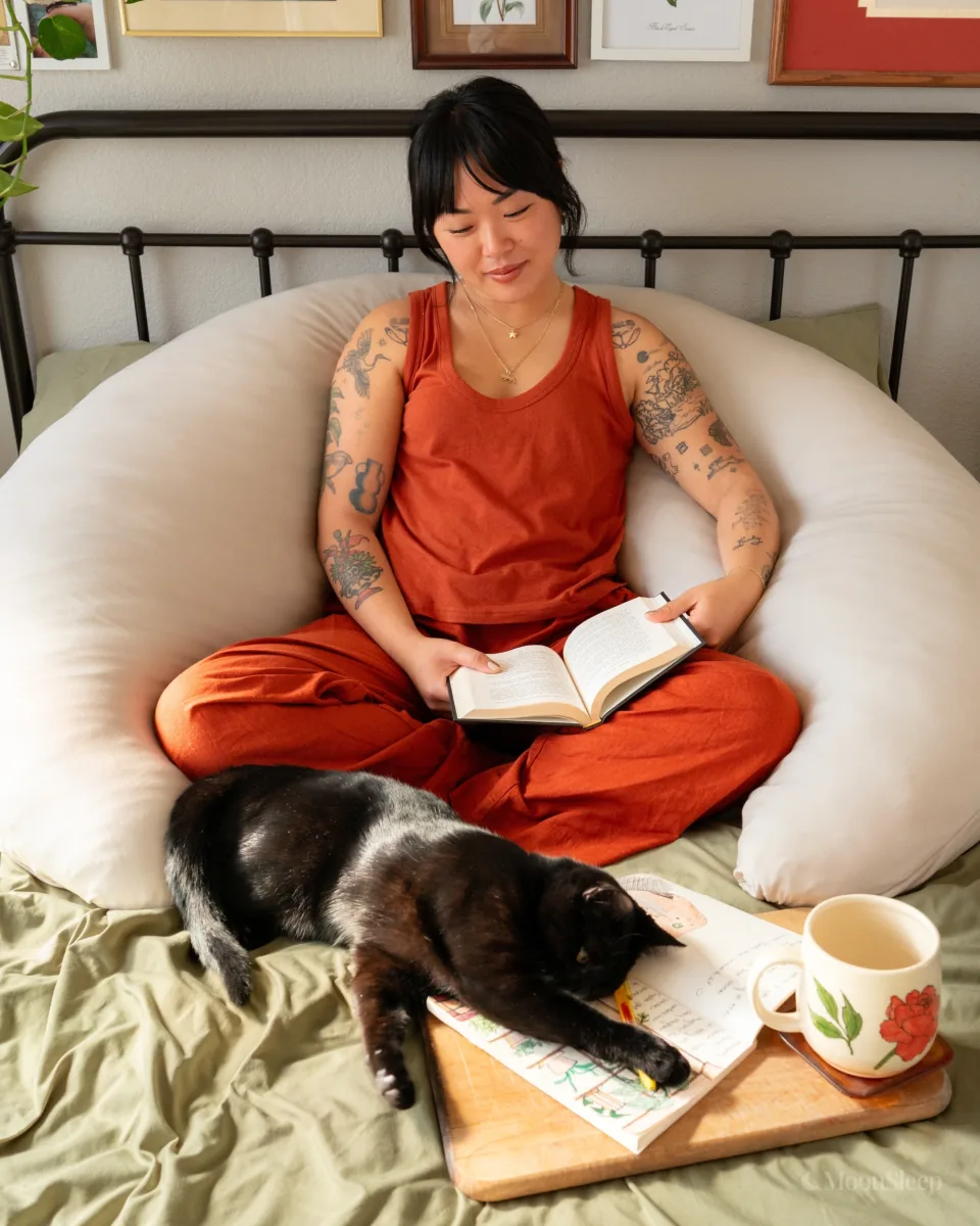 Sitting up inside the MoonSpoon’s curve with a book